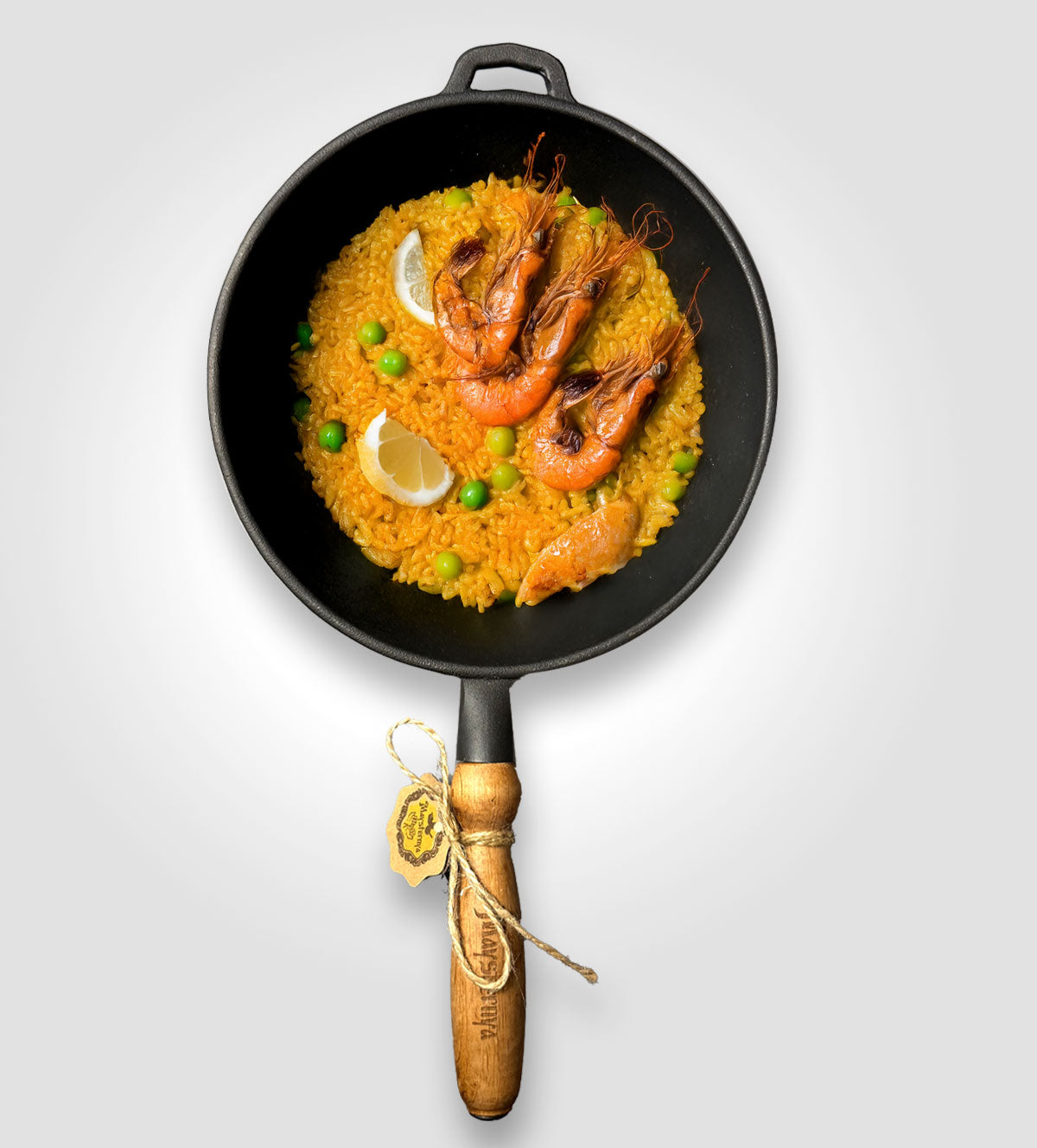 Gusseisenpfanne mit Holzgriff.